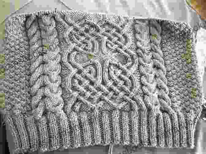 A Close Up Image Of An Aran Knitting Throw With Intricate Celtic Patterns Alternative Aran Throw: Knitting Pattern