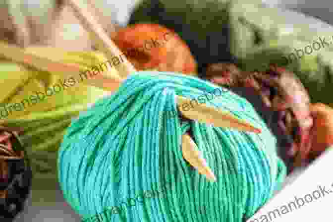 Close Up Image Of Knitting Needles And A Ball Of Yarn, Symbolizing The Start Of A Knitting Project SSK Little Cutie Knitting Pattern
