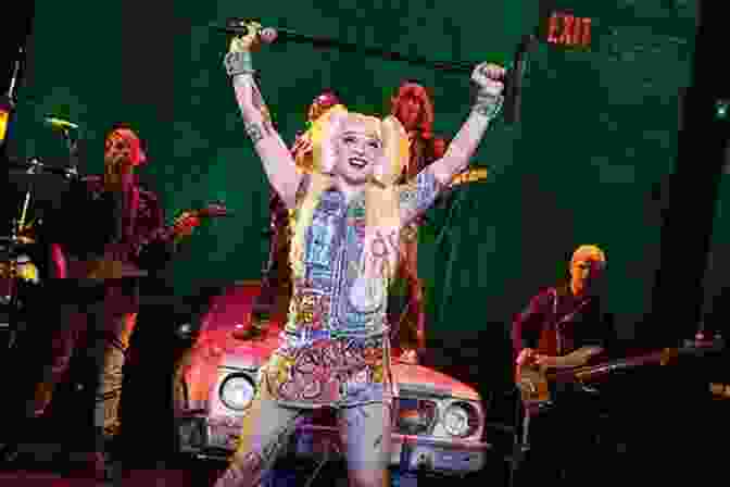 Hedwig Performing On Stage, Showcasing Her Androgynous Appearance And A Guitar Shaped Like An Angry Inch. Like A Fork Shoved On A Spoon : Notions Of Gender Identity Within Hedwig The Angry Inch And How This Made It A Cult Rock Musical