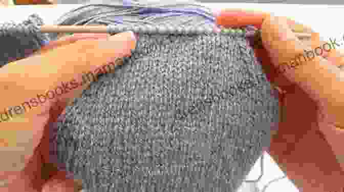 Image Showing The Shaping Process, Where Stitches Are Increased And Decreased To Create The Desired Shape Of The Baby Blanket SSK Little Cutie Knitting Pattern